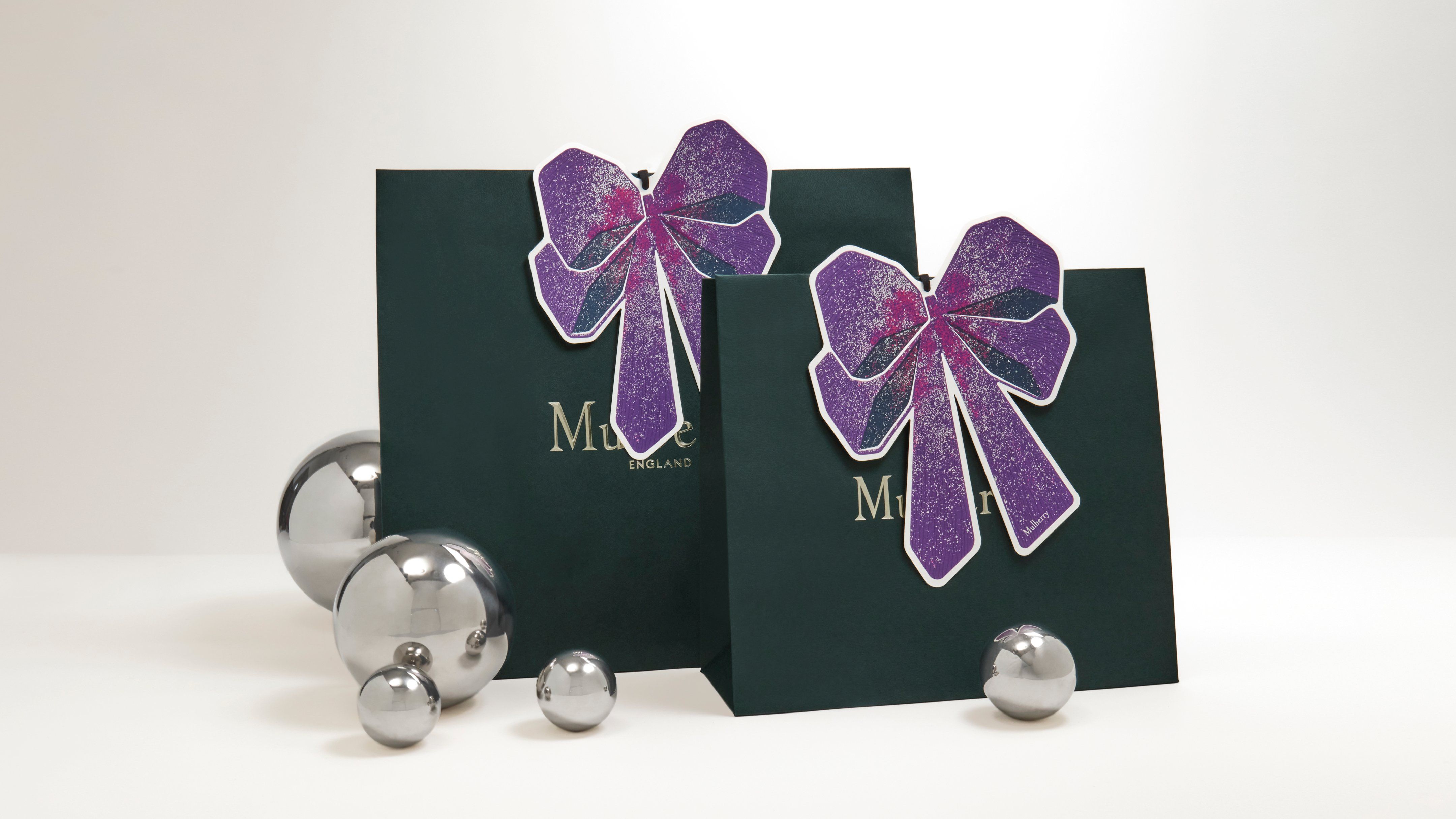 Mulberry packaging green bags with festive bows